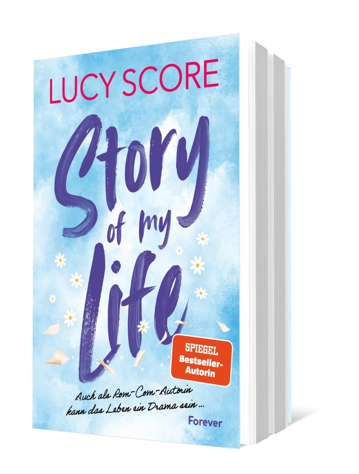 Cover von „Story of my Life“ von Lucy Score: Auf blauem Hintergrund steht der Titel in lila und rosa Schrift, umgeben von weißen, zarten Elementen, was eine fröhliche und leichte Stimmung vermittelt.